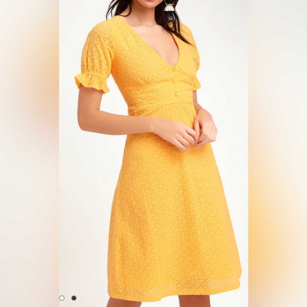 Lulu’s yellow eyelet low cut below the knee Easter spring dress.